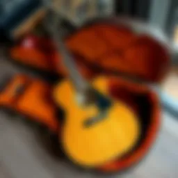 A 2021 D28 Modern Deluxe guitar in a deluxe case, showcasing its elegant design and finish, placed on a wooden surface
