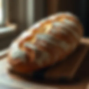 A fresh loaf of artisan bread on a wooden table, with an elegant crust and a soft interior, highlighting the beauty of handmade baking.