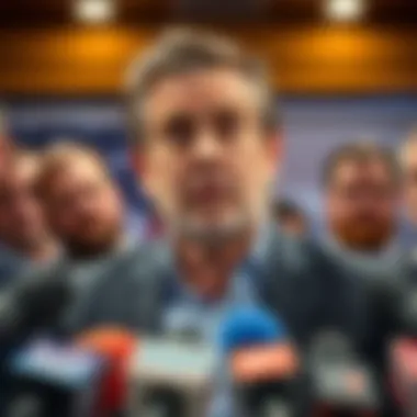 Ben Pasternak speaking at a press conference with a serious expression, addressing his business ventures and challenges.