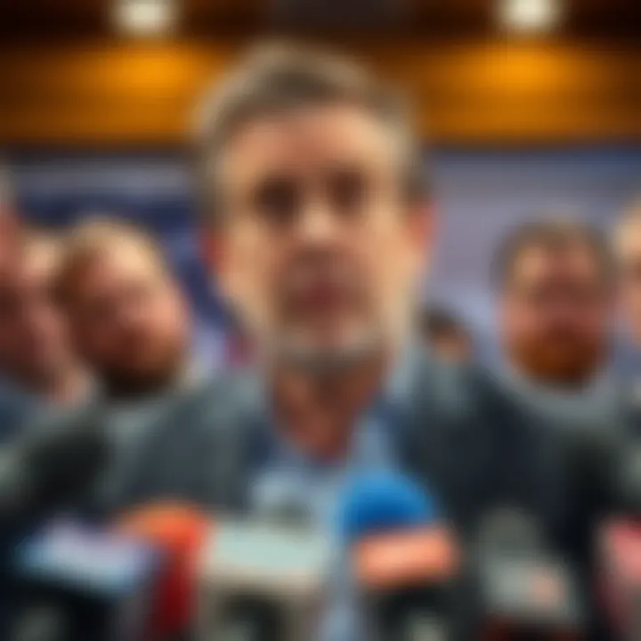 Ben Pasternak speaking at a press conference with a serious expression, addressing his business ventures and challenges.