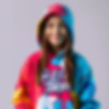 A creative 15-year-old girl shows off a bleach-designed hoodie inspired by the band Sleep Token, smiling proudly at her artistic work.