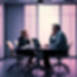 CEO and CTO in a meeting room CEO and CTO looking worried at a table with papers and a laptop, discussing theft allegations