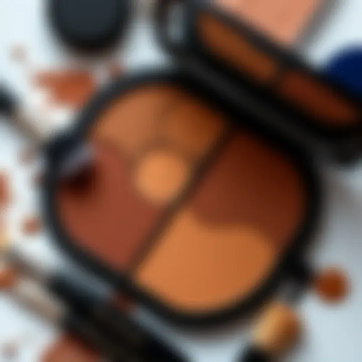 Flat lay of a makeup palette featuring a deep brown contour shade with brushes and beauty items
