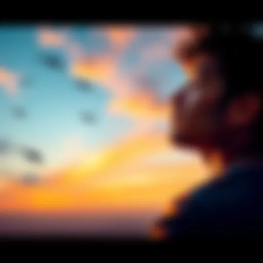 A person looking towards the horizon with a hopeful expression, symbolizing ambition and future success.