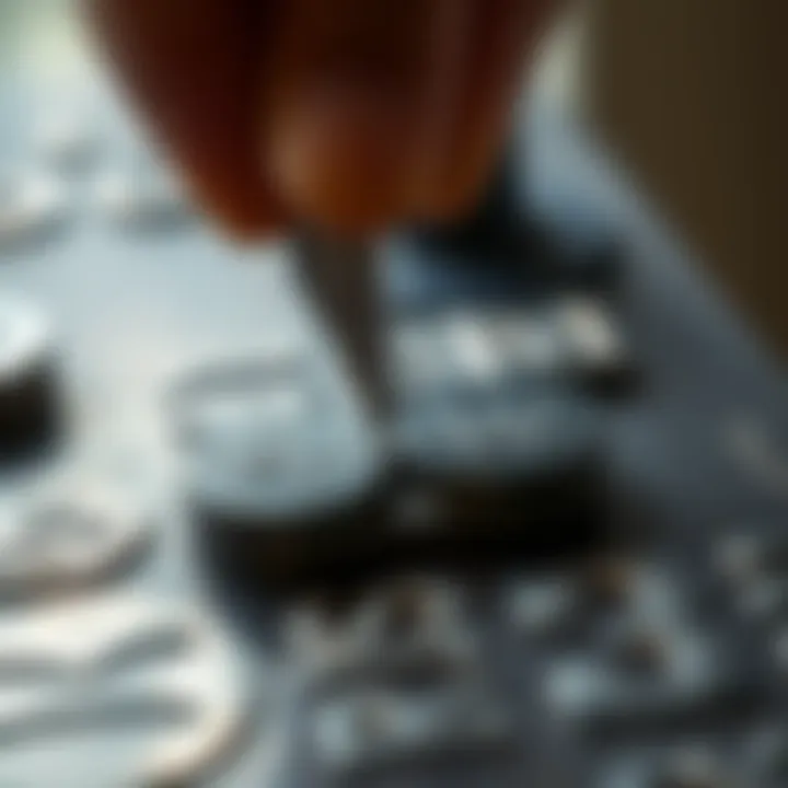 A person stamping a 24-word seed phrase into metal washers, focusing on the letters and numbers being engraved.