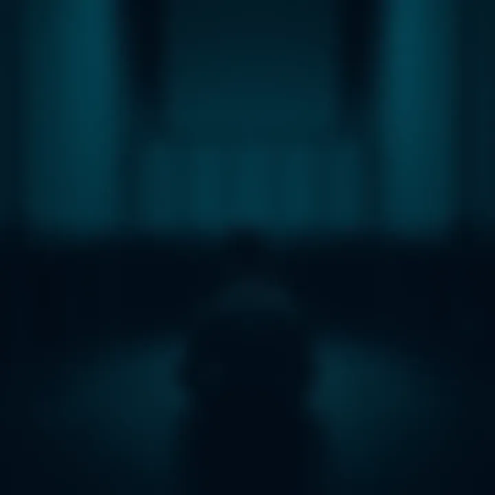 A person sitting alone in a dimly lit room, looking contemplative and worried, symbolizing the emotional toll of addiction.