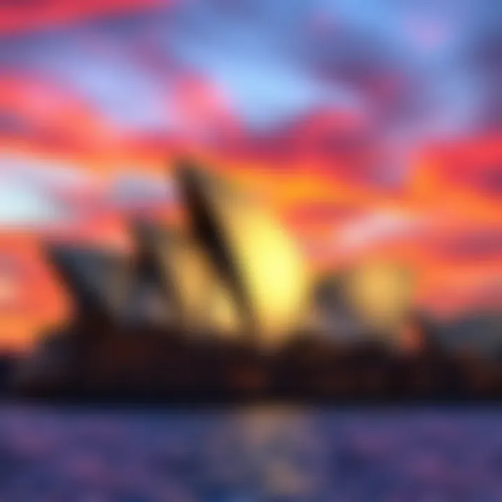The Sydney Opera House illuminated at sunset, showcasing its unique sails against a colorful sky
