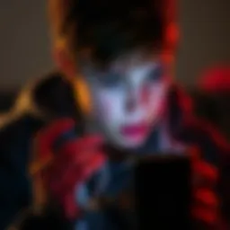 A teenager looking worried while texting on a phone, showing signs of distress.